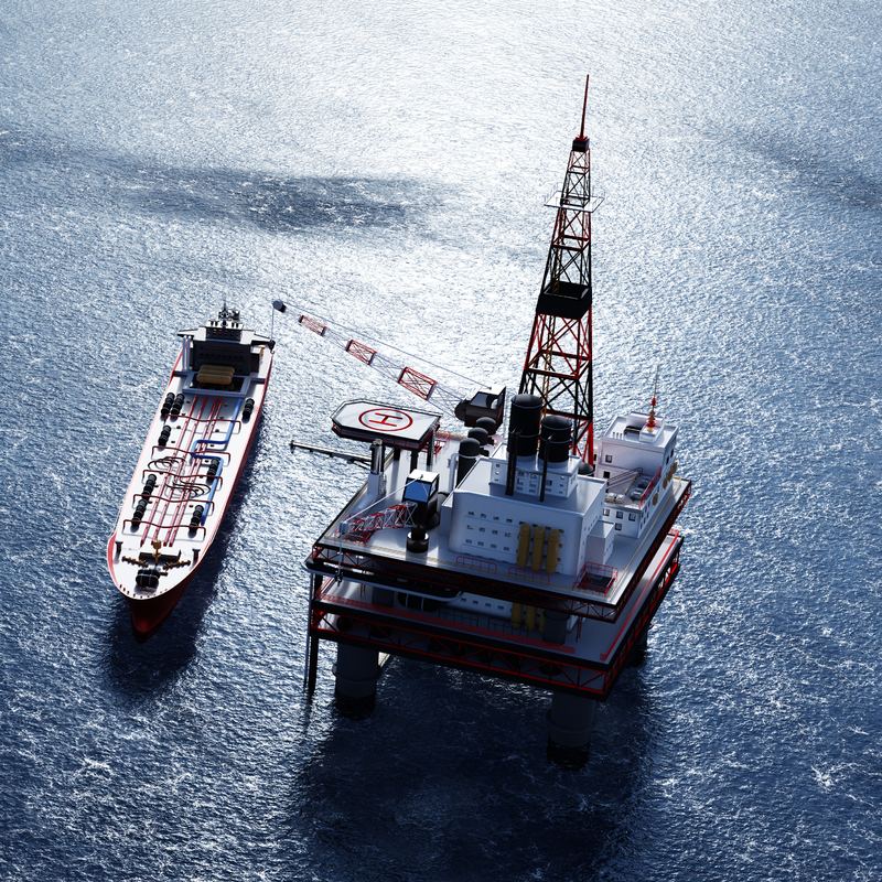Offshore drilling platform and tanker at sea